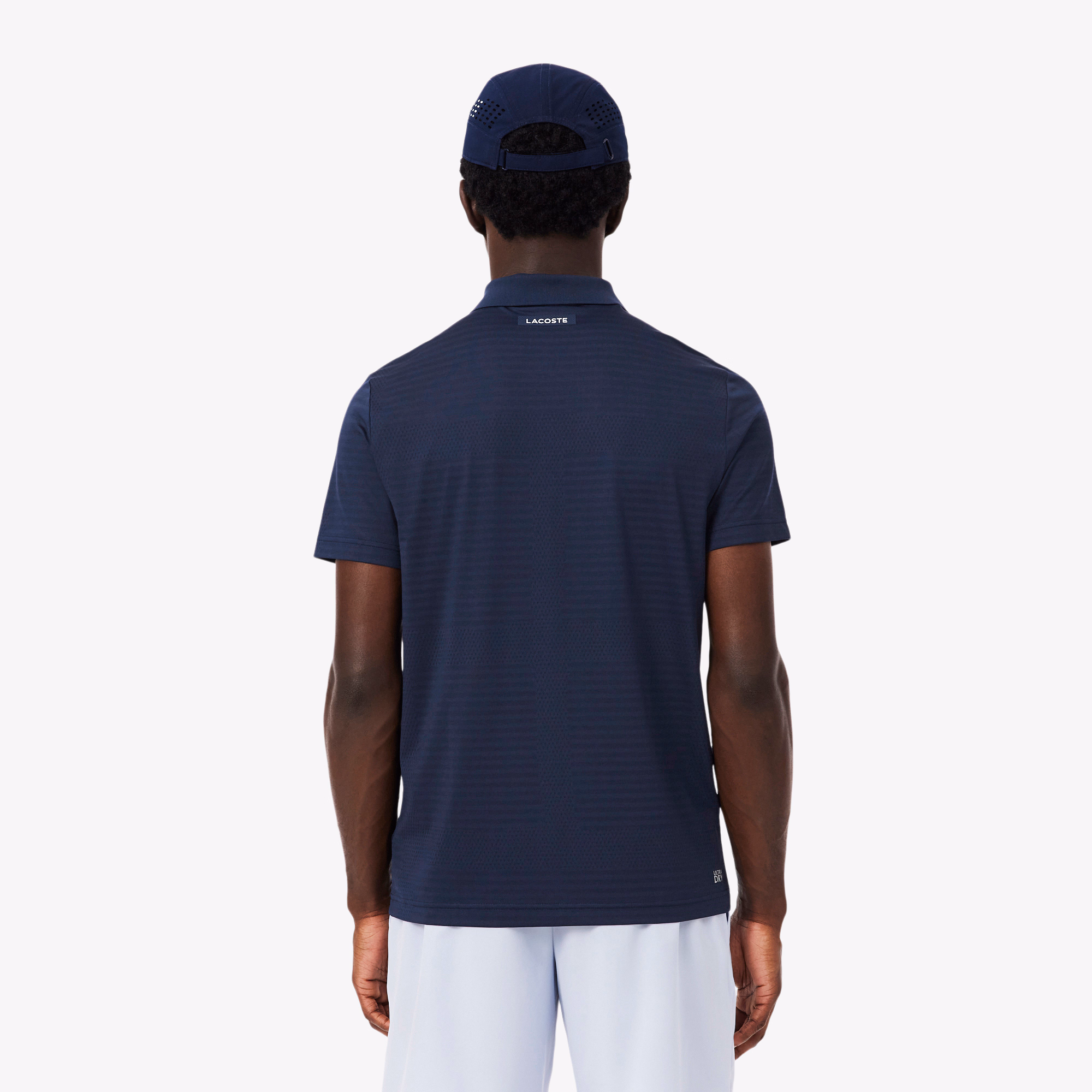 Polo tennis en jersey alvéolé ultra dry - LACOSTE Polo tennis en jersey alvéolé ultra dry - LACOSTE